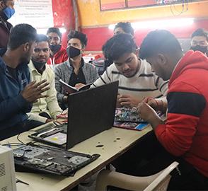 Men Repairing laptop