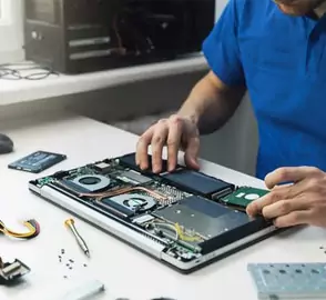 Men Repairing laptop